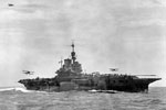 HMS Illustrious from aboard HMS Mauritius, August 1942. Photo: Lt. H. A. Mason. Imperial War Museums A 13560
