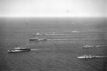 Malta convoy, August 10-12, 1942. Aerial view of some of the ships escorting the convoy. Nearest the camera is Eagle, then Indomitable and Victorious and in the background are Furious and Argus. Photo: Lt. F. G. Roper. Imperial War Museum A 11154