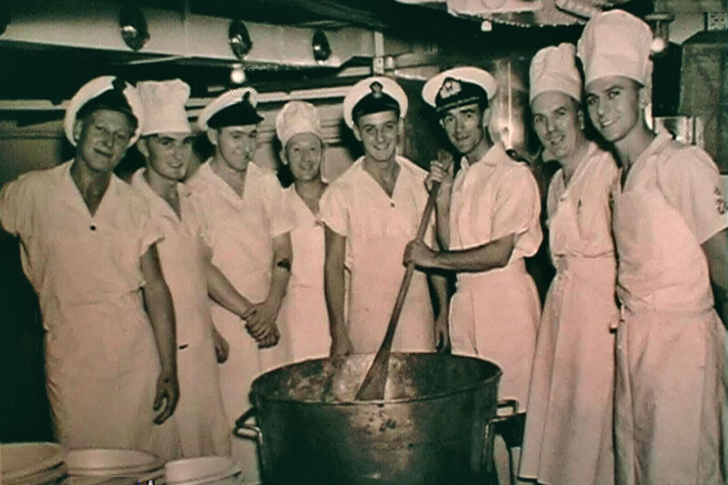 Christmas 1955 - The cooks stirring the Christmas pudding