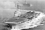 HMS Centaur with HMS Albion astern on December 10, 1954 near Malta. These ships used the latest developments at the time such as angled flight decks and the mirror sight deck landing aid. Imperial War Museum A 33086