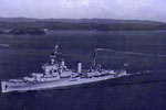 HMS Ceylon with her paying-off pennant flying. Possiibly leaving Trincomalee in September, 1954