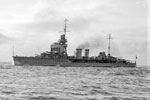 HMS Dragon, a Danae class cruiser, was built in December 1917 and scuttled near France in July 1944. Photo: Allan C. Green. State Library of Victoria H91.108/365