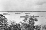 Ships of the Royal Navy, the Pakistan Navy, the Royal Ceylon Navy and the Indian Navy assembled at Trincomalee for Commonwealth naval exercises in August 1955. HMS Gambia is in the foreground. Imperial War Museums A 33348