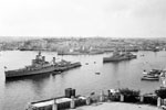 HMS Gambia with HMS Belfast behind in Malta, 1959