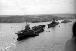 The Royal Navy anchorage at Grand Harbour, Malta around 1951. Vessels at anchor include Colossus class light fleet carrier HMS Warrior(foreground), United States Navy cruiser USS Des Moines (middle) and Fiji class cruiser HMS Gambia(background). My father would have been on Gambia when this photo was taken, but a year and a half later was transferred to Warrior. Imperial War Museum A 32043