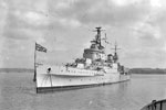 HMS Newcastle, a Southampton class cruiser, anchored in Plymouth Sound. No date. Imperial War Museums FL 4961