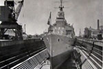 HMS Gambia in dry dock at Colombo, Ceylon during her 1957/58 commission. Photo from Christine Deane