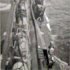 Transferring a torpedo tube to HMS Tudor. Photo from Christine Deane