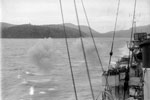 HMS Quilliam firing a starboard broadside on Sabang. Operation Crimson, July 25, 1944. Photo: Lt. C. Trusler. Imperial War Museums A 25112