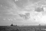 Eastern Fleet big ships returning from Sabang. left to right: HMS Kenya, HMS Queen Elizabeth, Valiant, Renown, FS Richelieu, and HMS Cumberland from HMS Racehorse. Operation Crimson, July 25, 1944. Photo: Lt. W. E. Rolfe. Imperial War Museums A 25650