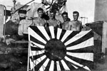 Crew of HMNZS Gambia with a capured Japanese flag. From original site, NMRNZN - AAI0157