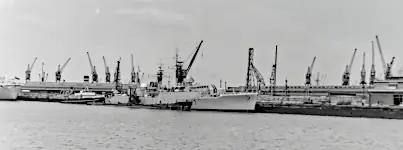 HMS Lynx. In front of her is the submarine HMS Seraph