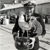 A beaming Captain Sam Davis of SAS President Steyn ("Superduck") with the Cock of the Fleet trophy in 1975.