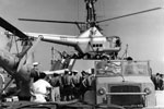Helicopters are brought to Zante by HMS Bermuda to carry out aerial surveys, August 1953. Image from Imperial War Museums, A32690