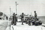 Royal Marines from HMS Gambia waiting to return to the ship, August 1953. Image from Stan Coulding